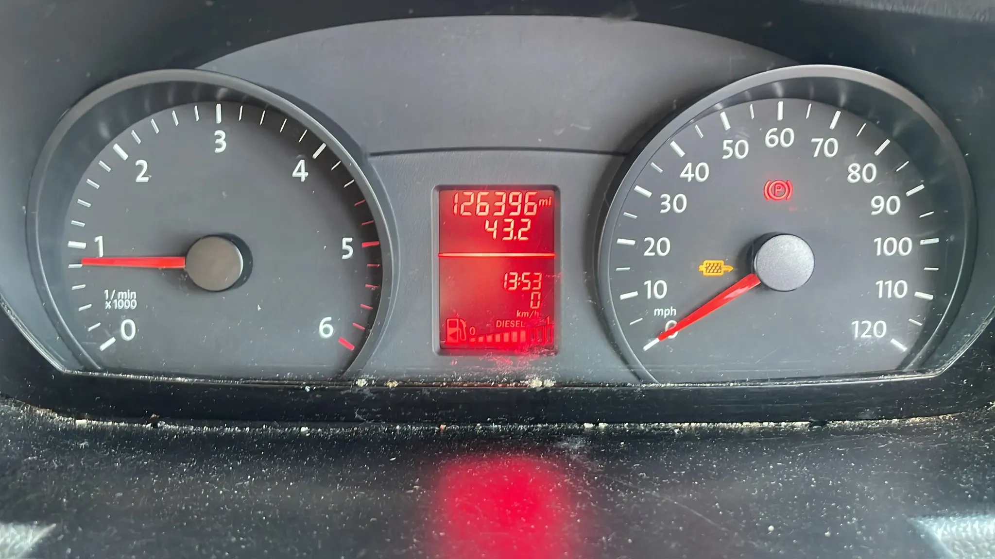 DPF warning light illuminated on a diesel dashboard