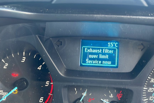 Dashboard displaying a DPF error, suggesting the exhaust filter is blocked and needs diesel particulate filter cleaning.